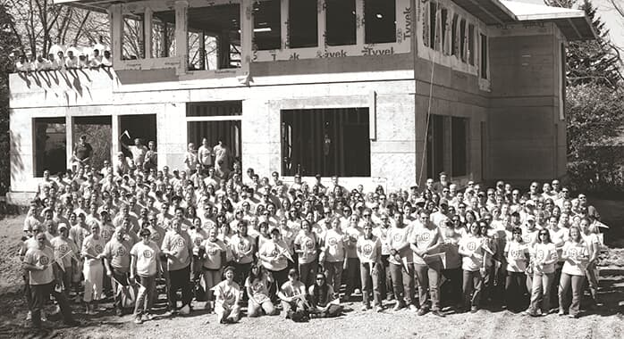 A black and white photo of Carma employees before becoming Brookfield Residential