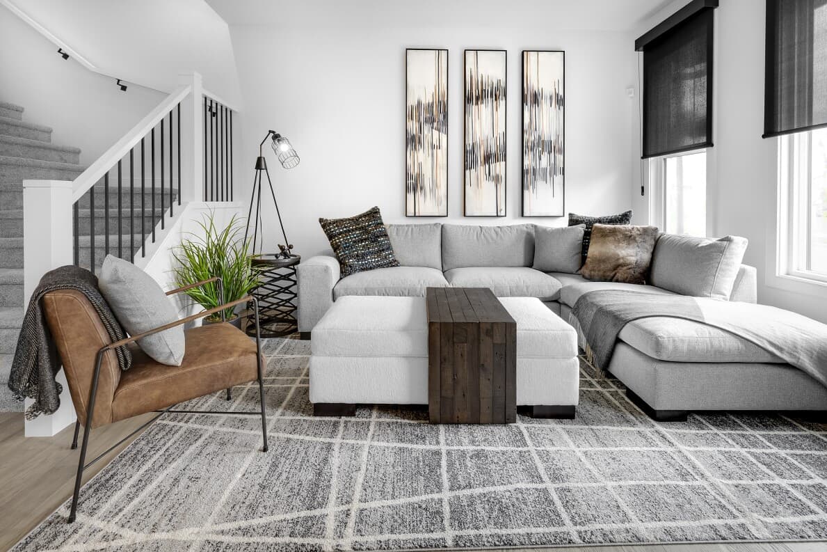 Living room at Eton at Chappelle Gardens by Brookfield Residential in Edmonton, AB