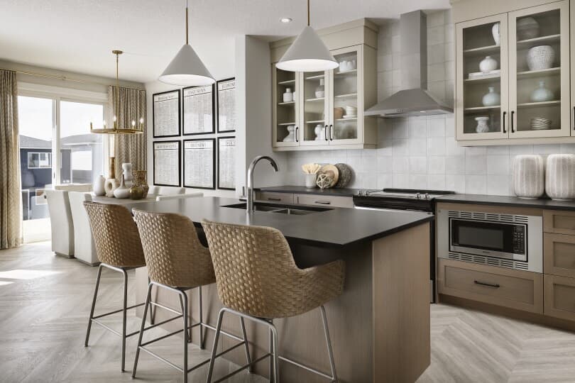 Kitchen and dining area in Purcell at The Orchards by Brookfield Residential in Edmonton AB