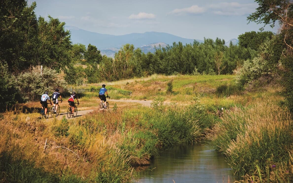 Group of people biking at Clear Creek in Denver CO