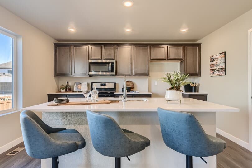 Kitchen in the Essence Portfolio at Brighton Crossings by Brookfield Residential in Denver CO