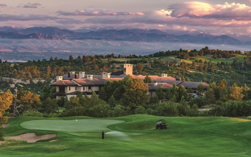 View of the golf course and club house at The Village at Castle Pines in Denver, CO