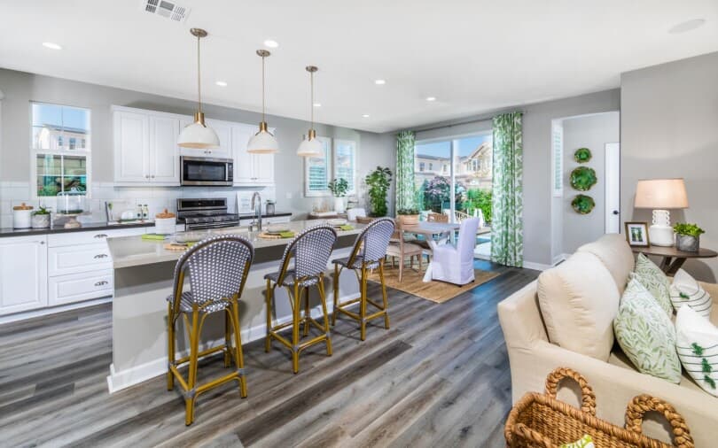 Tropical kitchen in Residence 3 at Poppy at New Haven in Ontario Ranch, CA by Brookfield Residential