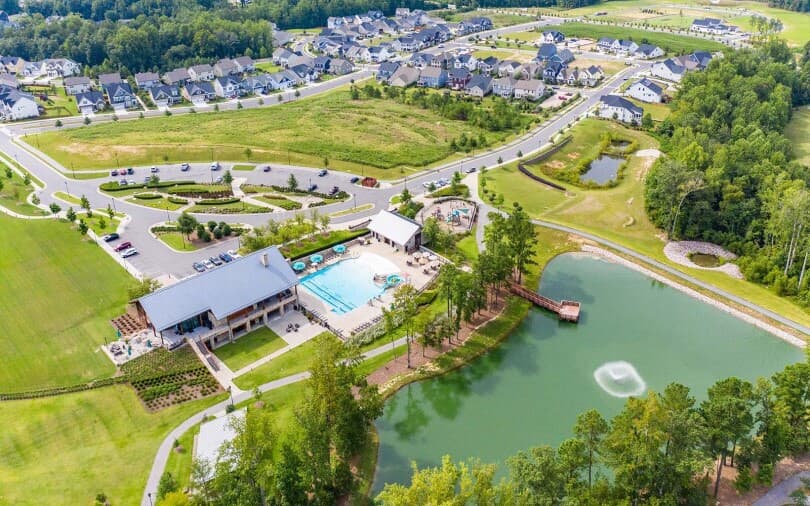 Aerial view of lake and pool at Wendell Falls by Brookfield Residential in Wendell NC