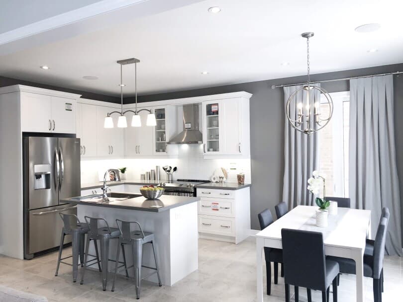White kitchen with gray walls at Pinehurst by Brookfield Residential in Ontario