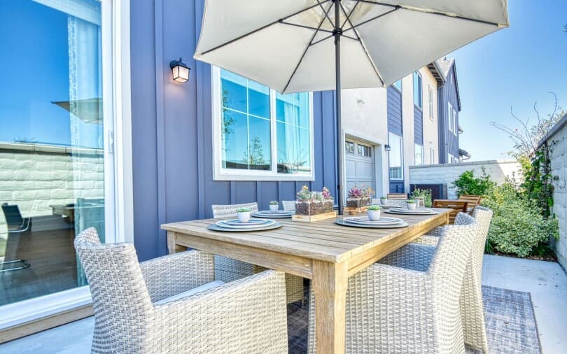 Outdoor dining table at Citrus Plan 5 at New Haven by Brookfield Residential in Ontario Ranch CA