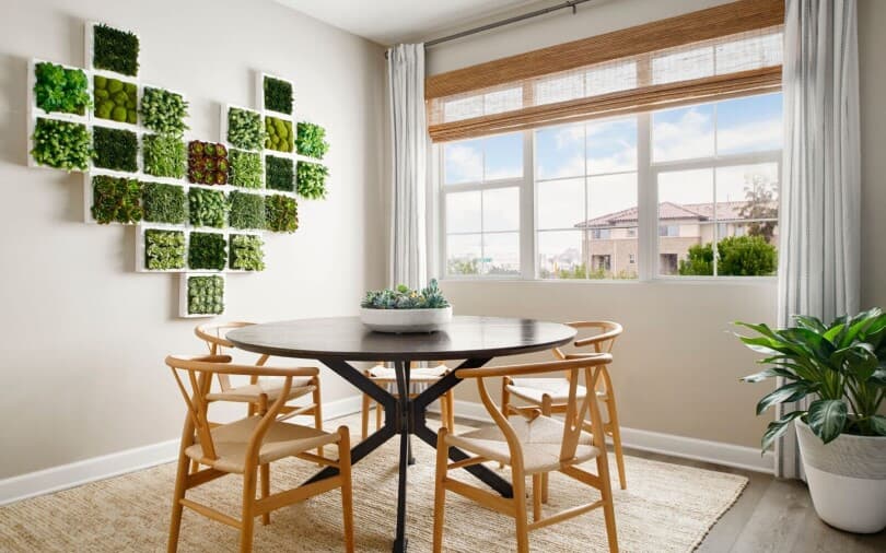Living succulent wall in Gardens Plan 2 dining room by Brookfield Residential SoCal