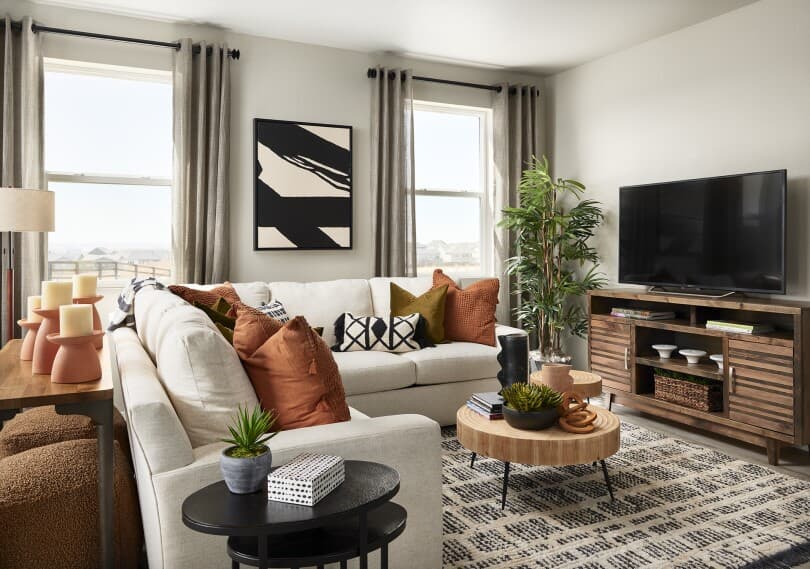 Living room in Mosaic Plan 5 at Barefoot Lakes by Brookfield Residential in Denver CO