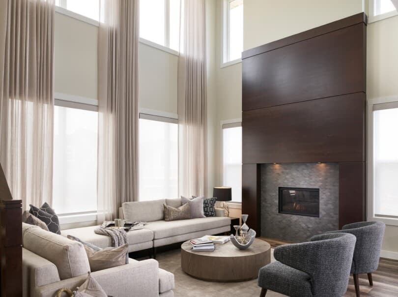 Floor to ceiling drapes in the great room of Savona 3 at Cranston's Riverstone in Calgary, AB