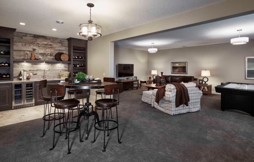 Bar basement in Wellington 5 at Cranstons Riverstone by Brookfield Residential in Calgary, AB