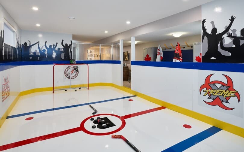 Basement hockey rink in Carlisle 2 at Chinook Gate by Brookfield Residential in Airdrie, AB