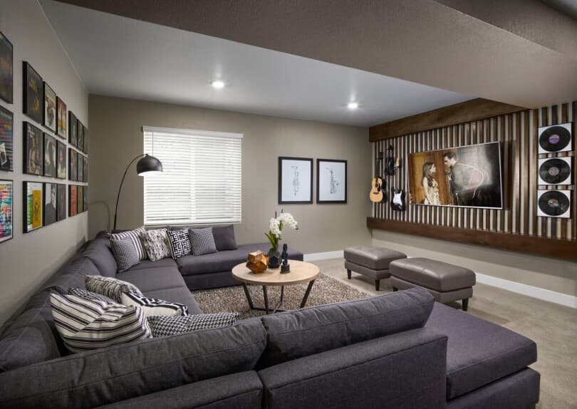 Basement home theater in Villa 2 at Barefoot Lakes by Brookfield Residential in Firestone, CO