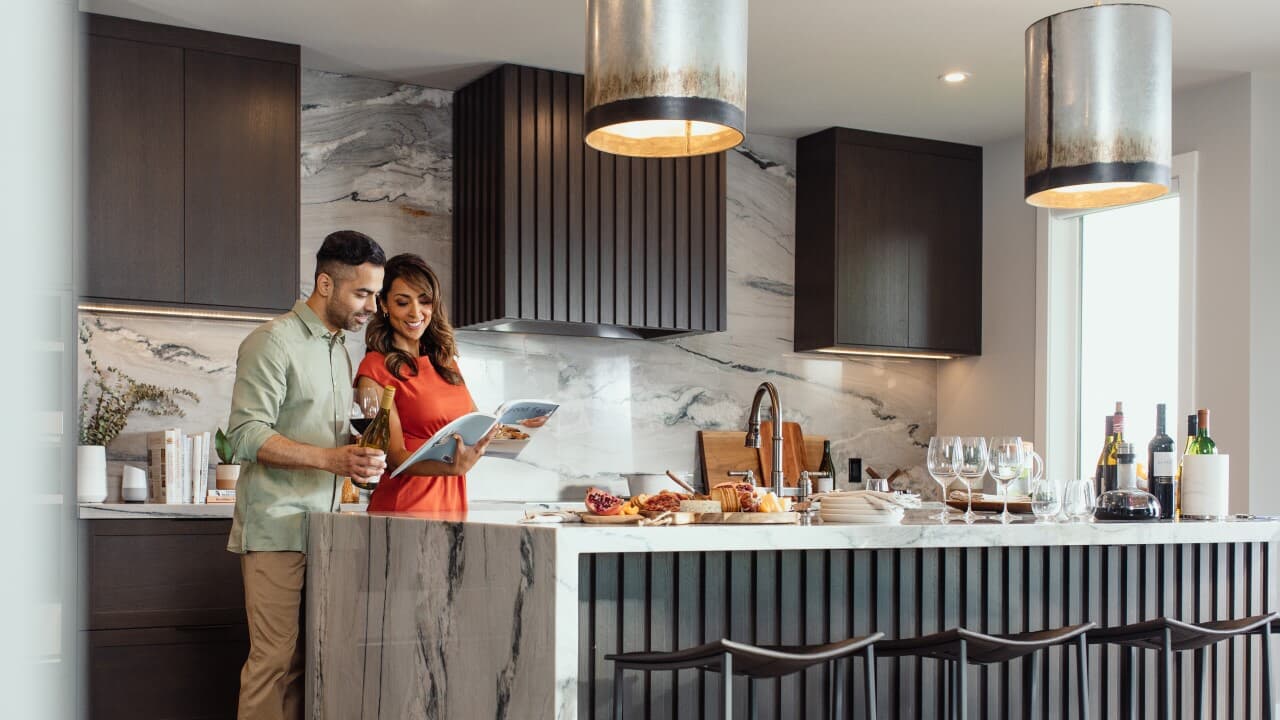 https://cdn.brookfieldresidential.net/-/media/brp/global/modules/news-and-blog/corporate/is-it-better-to-rent-or-buy-2025/couple-in-the-kitchen-of-their-brookfield-residential-home-in-calgary-1280.jpg