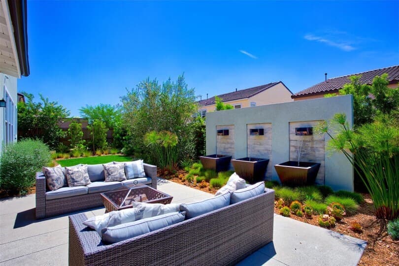 Outdoor lounge and water feature at Haciendas Residence 3 by Brookfield Residential in Chula Vista CA