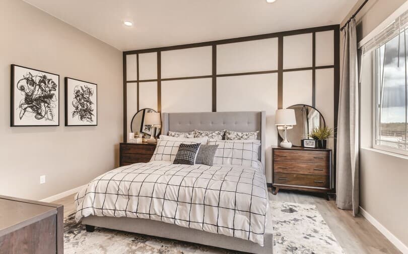 Black and white master bedroom in the Villa 2 at Barefoot Lakes in Denver, CO by Brookfield Residential