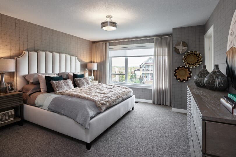Master bedroom in a home at Cranston's Riverstone in Calgary, AB by Brookfield Residential