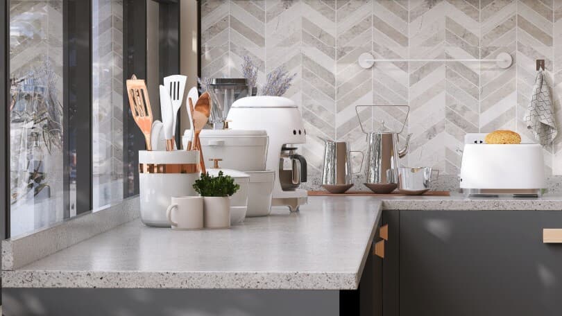 Solid surface countertop in a gray tone kitchen