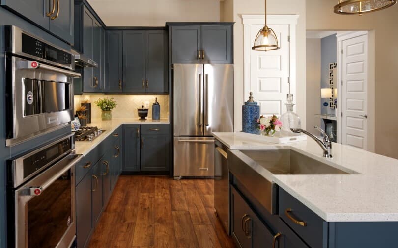 Stylish navy blue kitchen in the Picasso at Heritage Shores in Bridgeville, DE