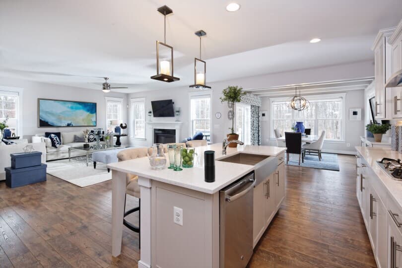 Interior view of the kitchen and great room in  the Kensington plan inside the Avendale community in Bristow VA