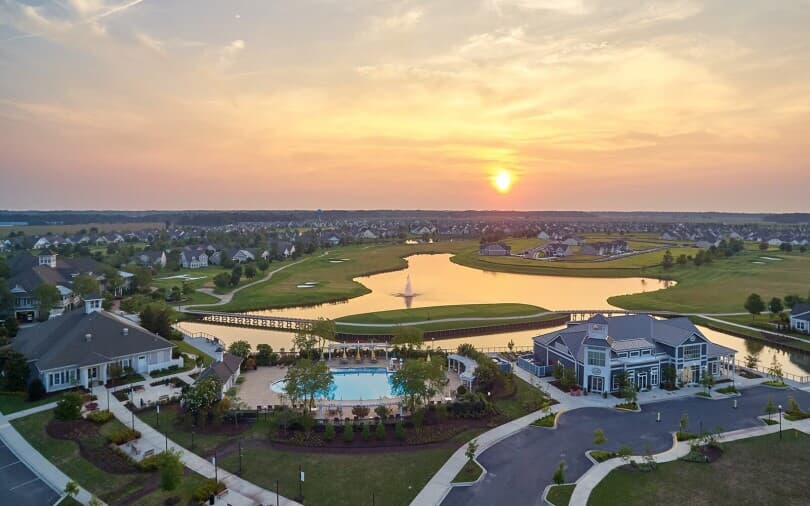 Aerial sunset view of the amenities at Heritage Shores by Brookfield Residential in Bridgeville DE