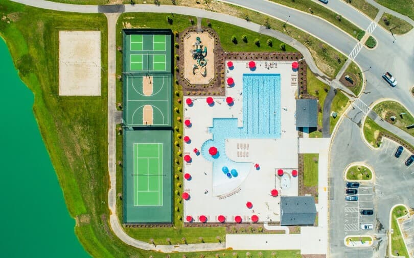 Aerial overview of the Hamlet Clubhouse pool and courts at Two Rivers in Odenton, MD
